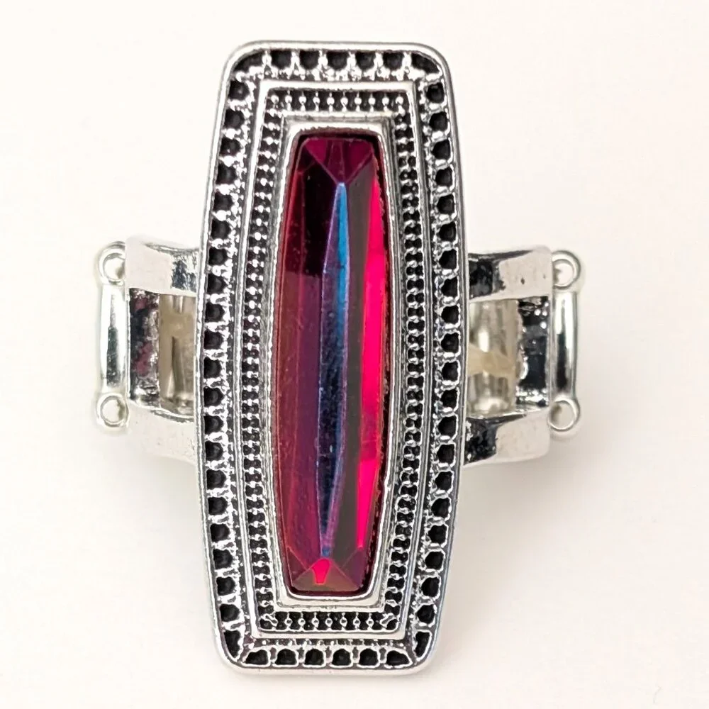 Orangey red glass ring with center bright blue stripe stretch ring